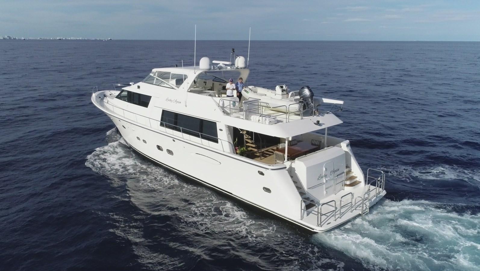 a boat on the water aboard LUCKY AGAIN Yacht for Sale
