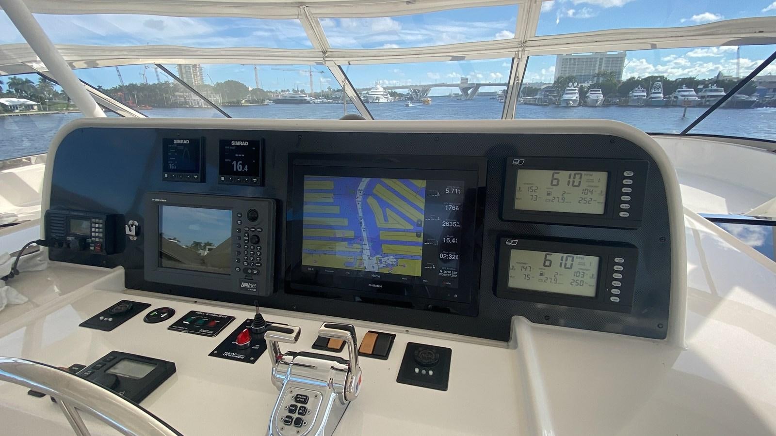 a control panel on a car aboard LUCKY AGAIN Yacht for Sale