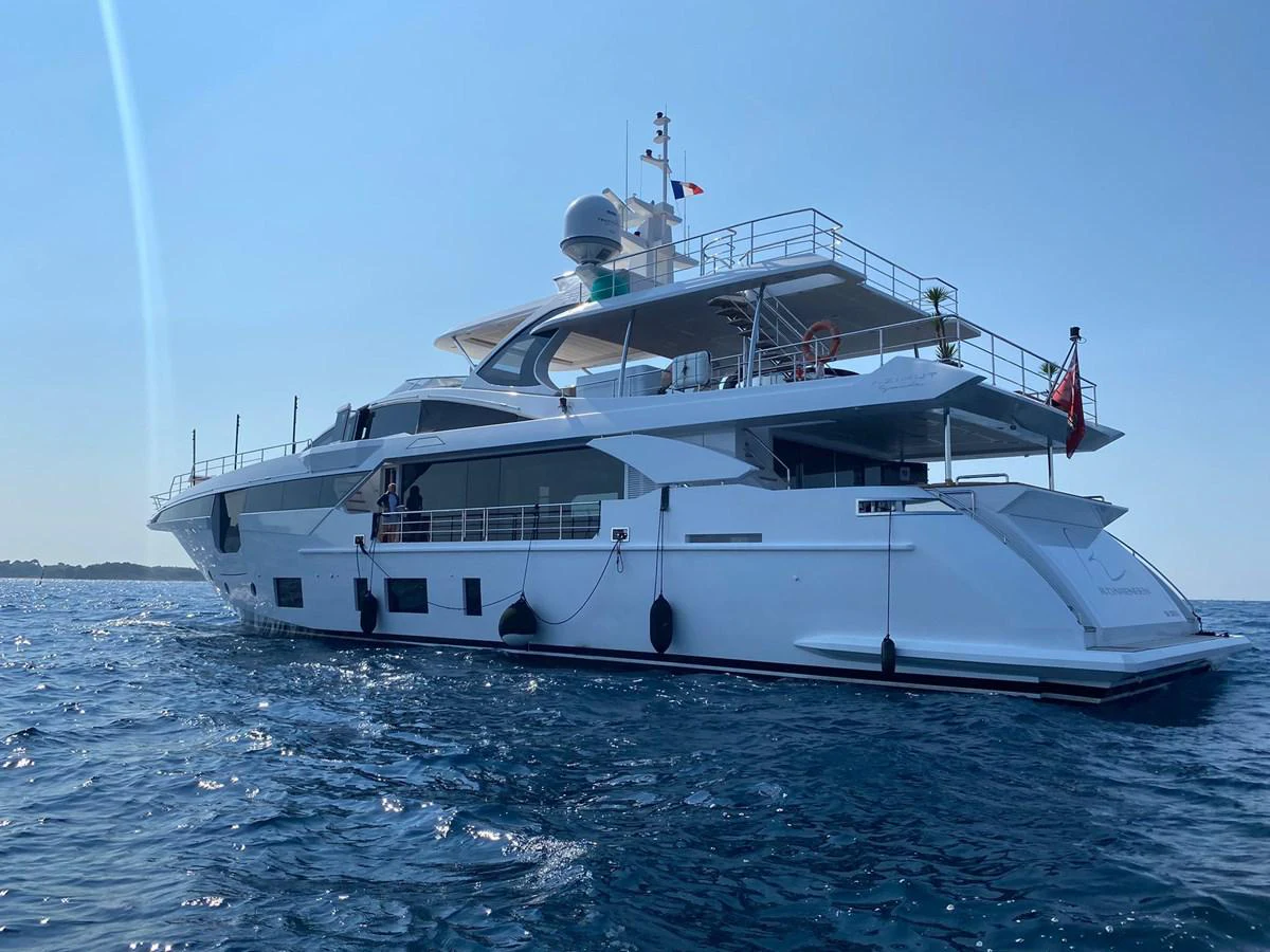 a large white boat on the water aboard R.DARENBEN Yacht for Sale