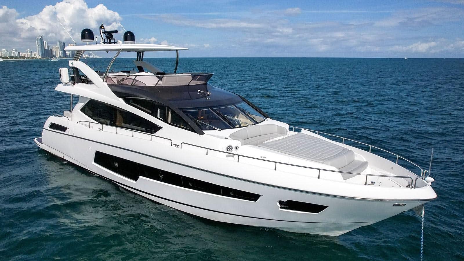 a white yacht in the water aboard M4 Yacht for Sale