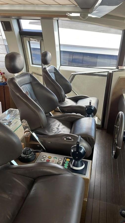 a leather chair in a train aboard DUKE Yacht for Sale