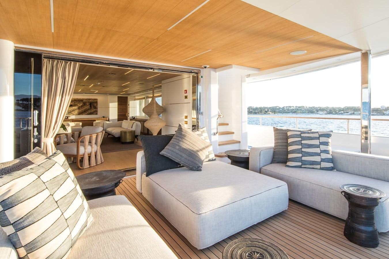 a large living room with a large window aboard SABAI Yacht for Sale
