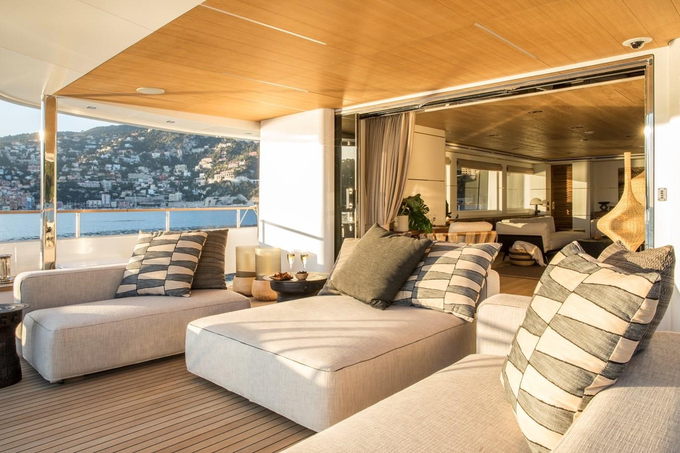 a living room with a large window aboard SABAI Yacht for Sale