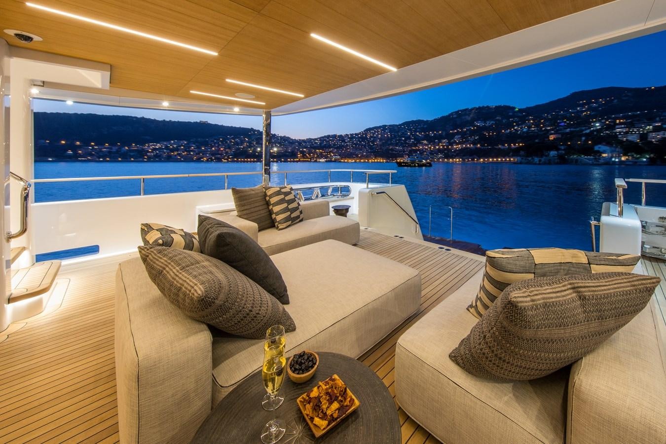 a living room with a large pool aboard SABAI Yacht for Sale