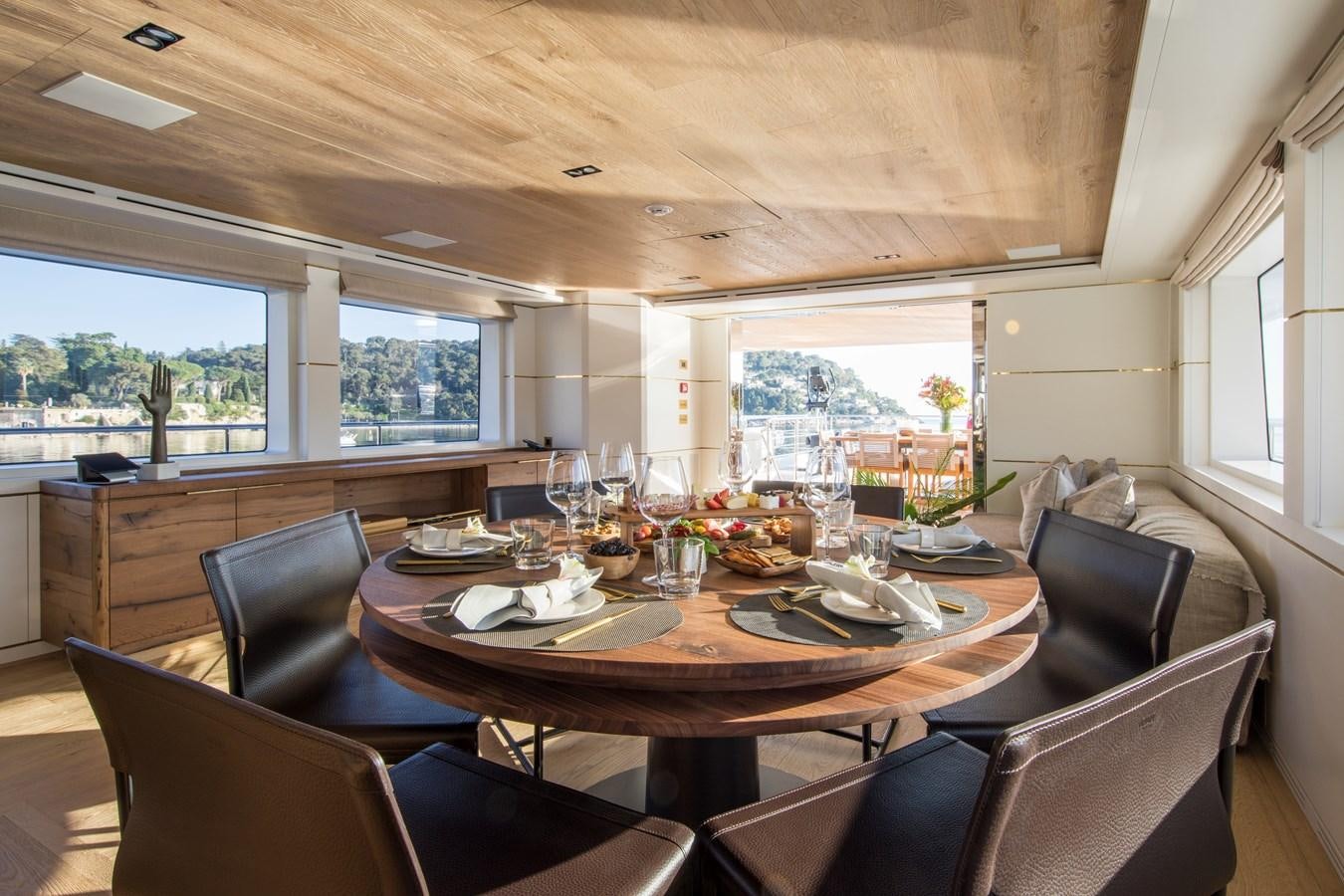 a dining table in a rv aboard SABAI Yacht for Sale