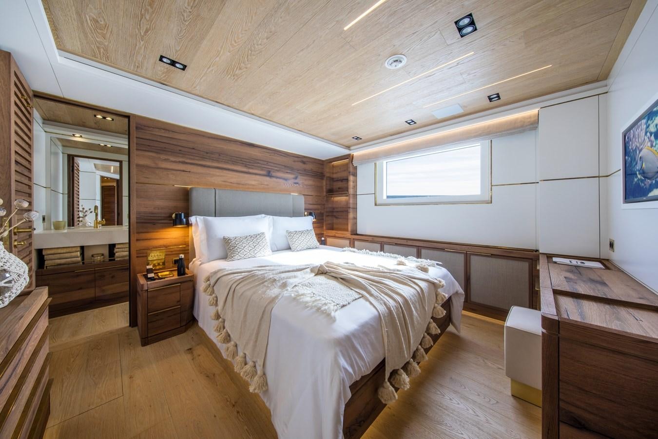 a room with two beds aboard SABAI Yacht for Sale
