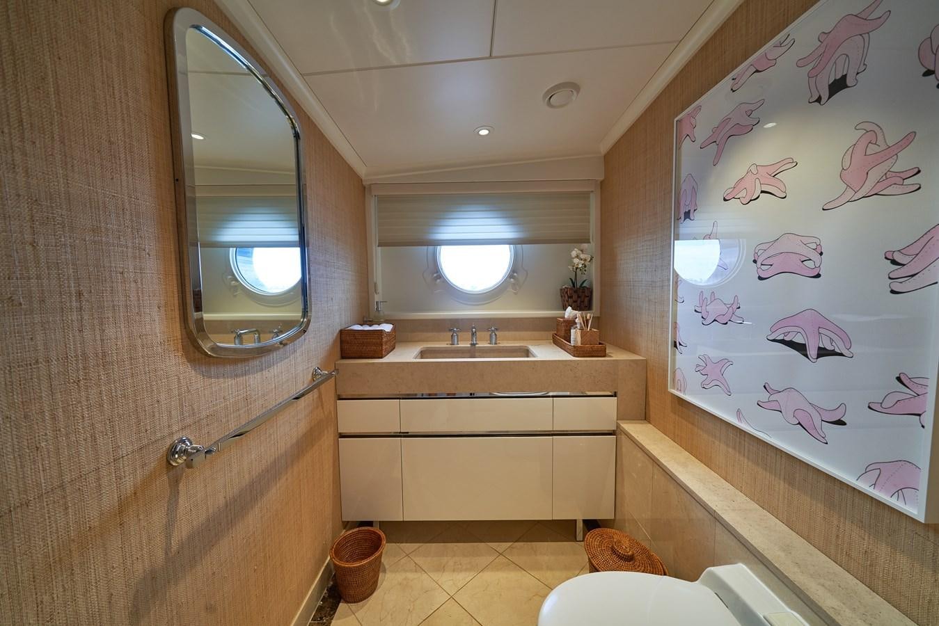a bathroom with a sink and a mirror aboard ASTERIA Yacht for Charter