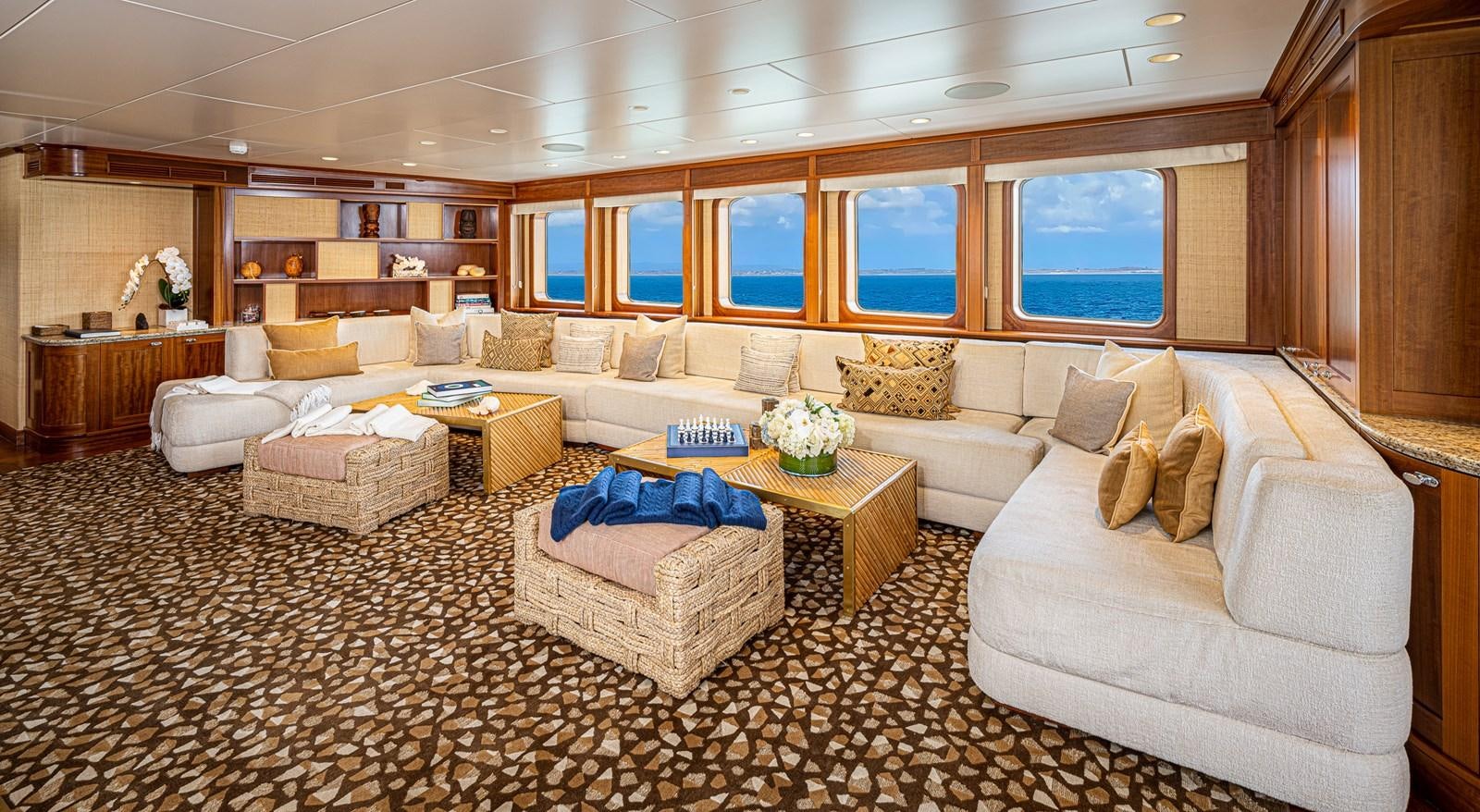 a living room with a large window aboard ASTERIA Yacht for Sale
