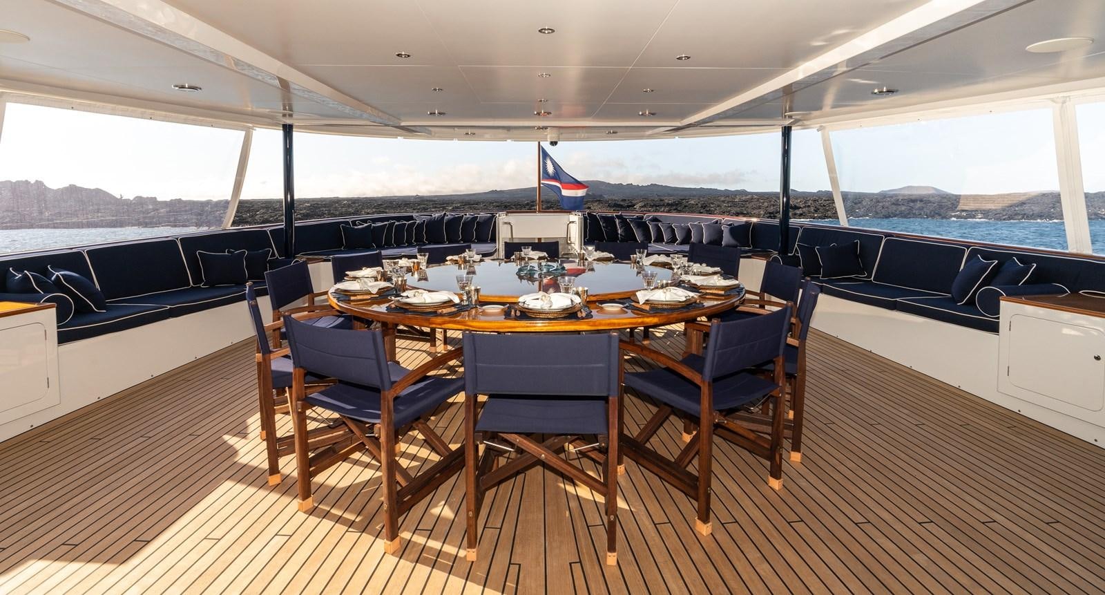 a dining table in a room aboard ASTERIA Yacht for Sale