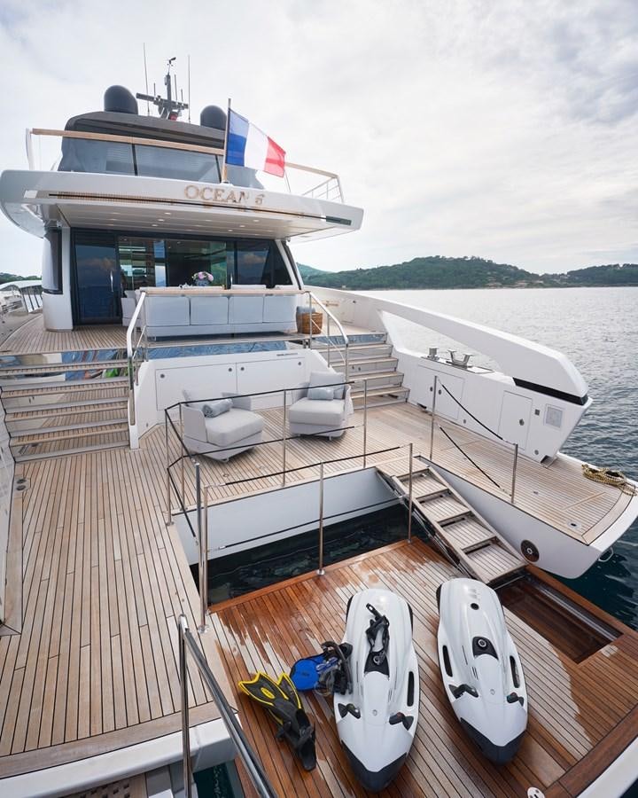 a boat docked at a pier aboard OCEAN 6 Yacht for Sale