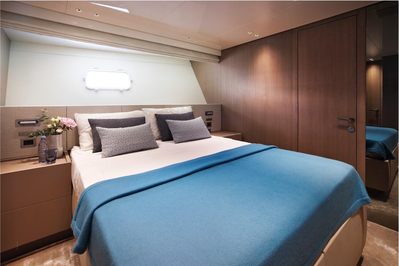 a bed in a room aboard OCEAN 6 Yacht for Sale