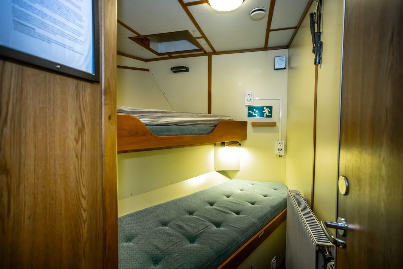 a bed in a room aboard ASTRA Yacht for Sale