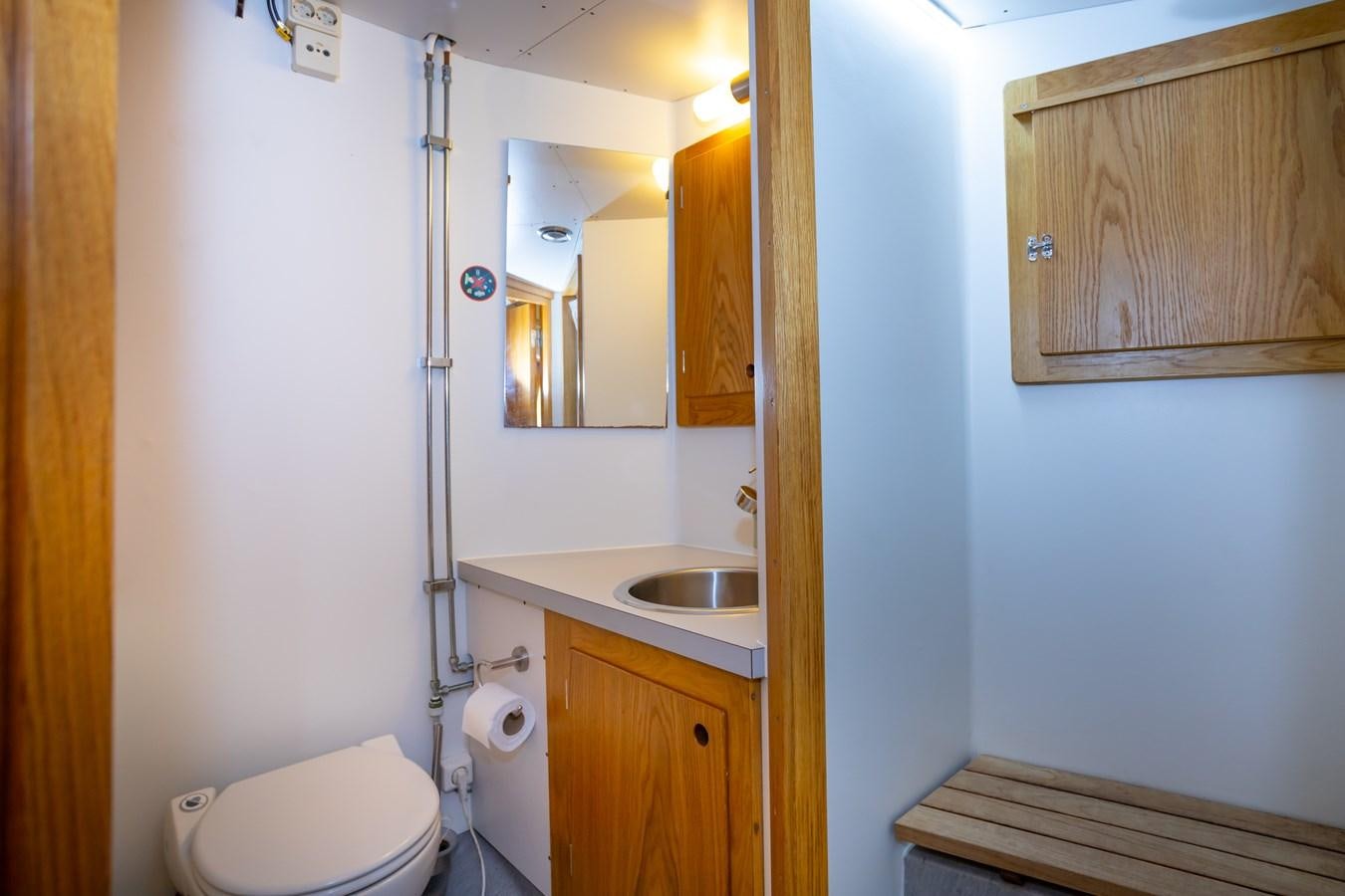 a bathroom with a sink and a toilet aboard ASTRA Yacht for Sale