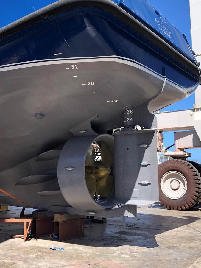 a large military vehicle aboard ASTRA Yacht for Sale