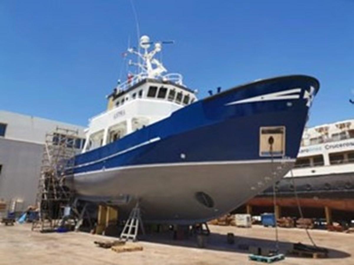 a large blue and white ship aboard ASTRA Yacht for Sale