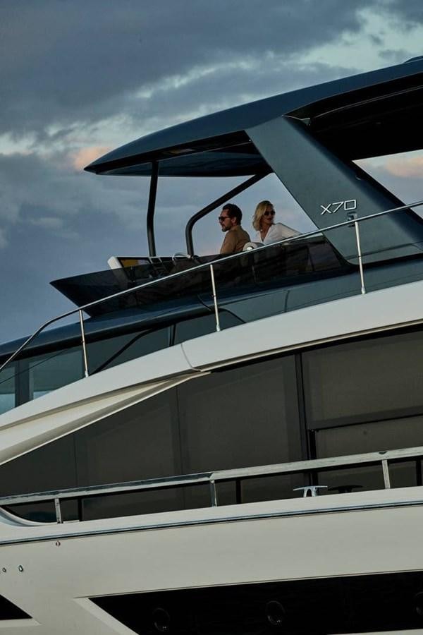 a couple of people sitting on a boat aboard ROCKSTAR Yacht for Sale