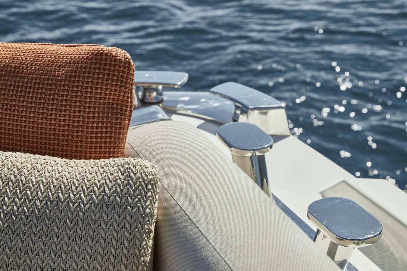 a boat with seats on the deck aboard ROCKSTAR Yacht for Sale