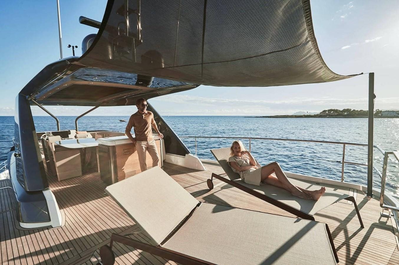 a man and a woman on a boat aboard ROCKSTAR Yacht for Sale