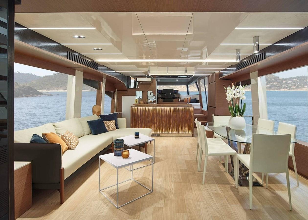 a living room with a large balcony aboard ROCKSTAR Yacht for Sale