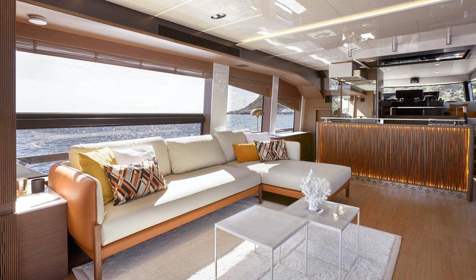 a living room with a large window aboard ROCKSTAR Yacht for Sale
