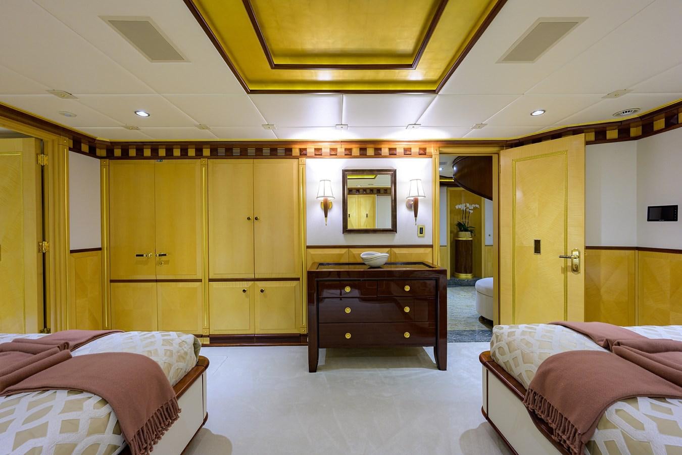 a room with wooden cabinets aboard STARSHIP Yacht for Charter