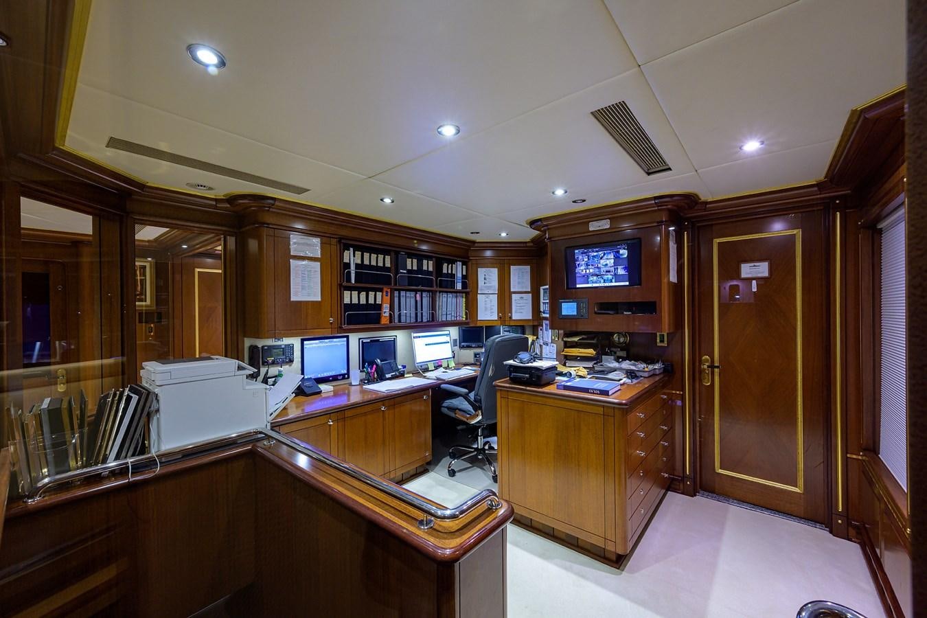 an office with computers aboard STARSHIP Yacht for Charter