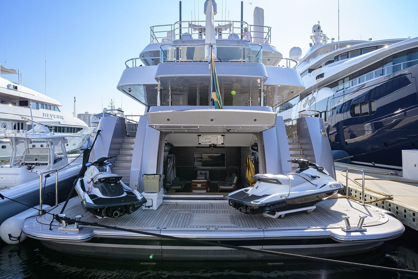 a group of boats docked aboard STARSHIP Yacht for Charter