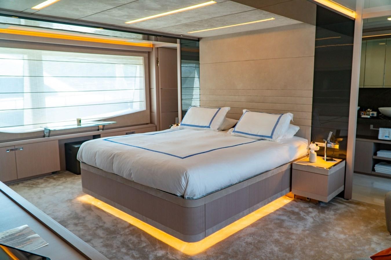 a bed in a room aboard ARES Yacht for Sale