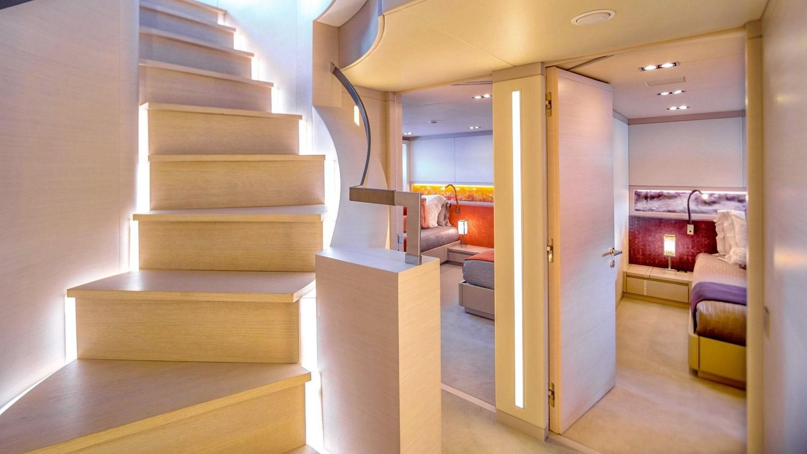 a staircase with a glass door aboard QUEEN ALLA Yacht for Sale