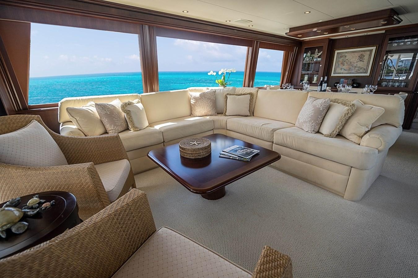 a living room with a large window aboard TRUE NORTH Yacht for Sale
