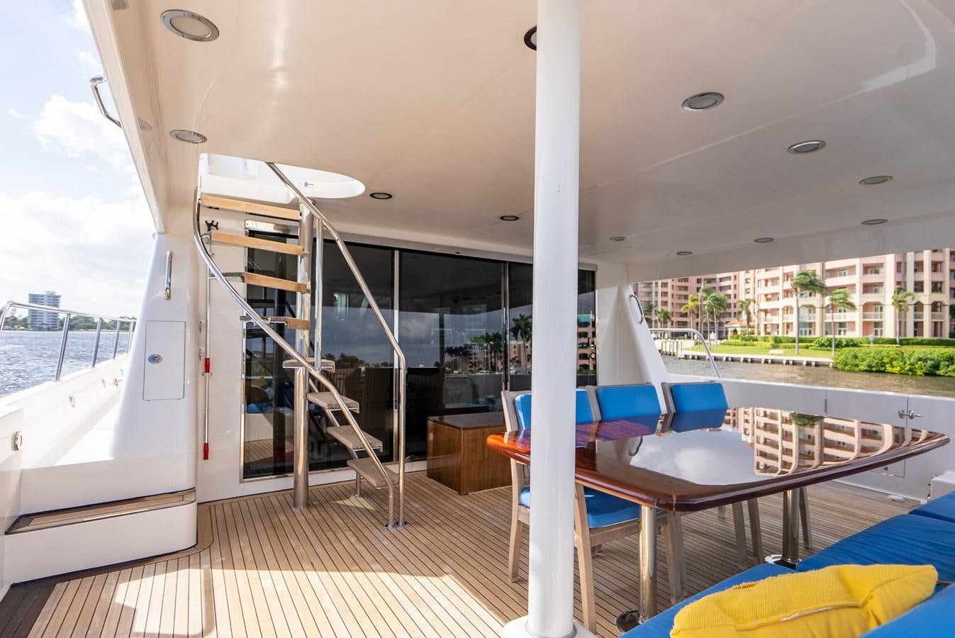 a large balcony overlooking a beach aboard TRUE NORTH Yacht for Sale