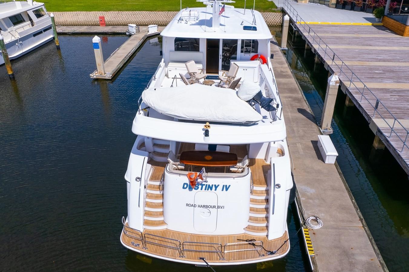 a boat docked at a pier aboard DESTINI IV Yacht for Sale