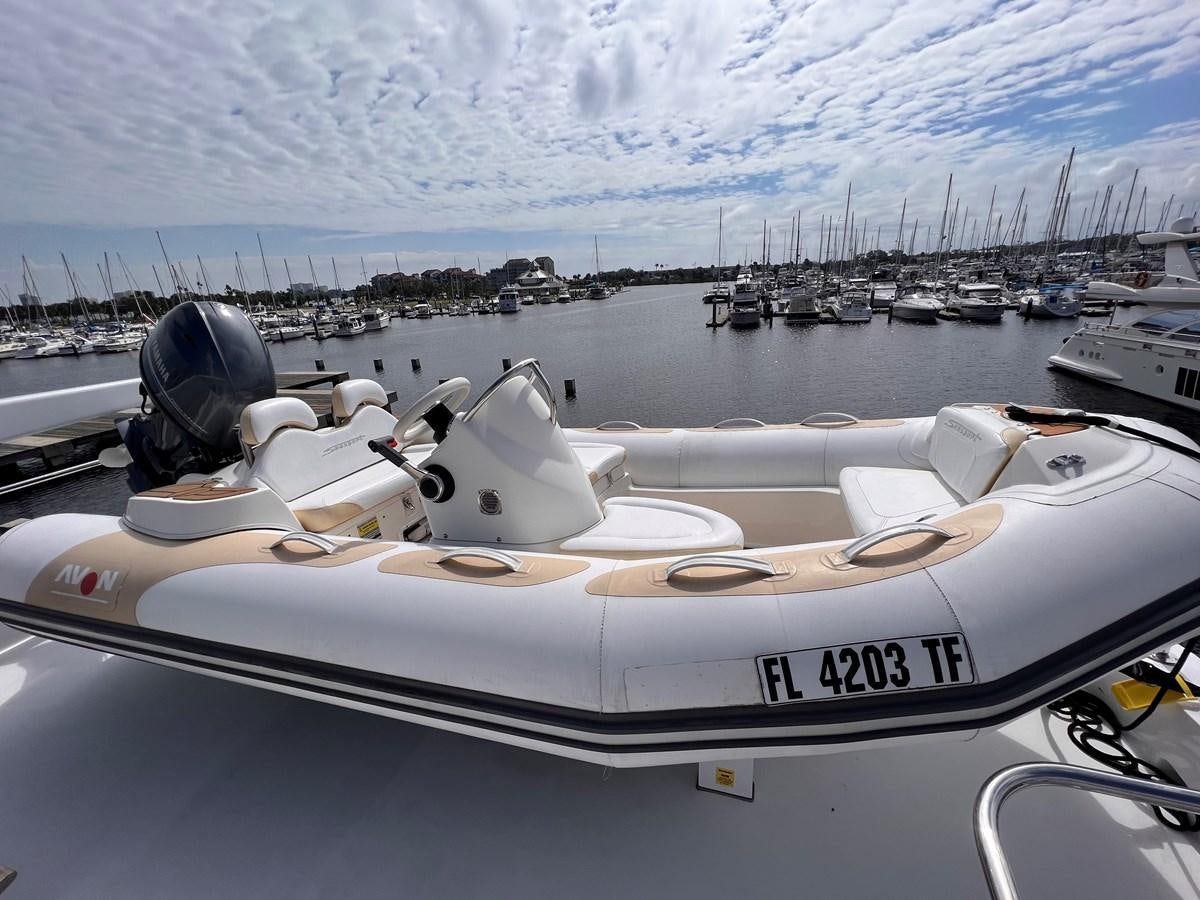 a boat with a motor on it aboard DESTINI IV Yacht for Sale