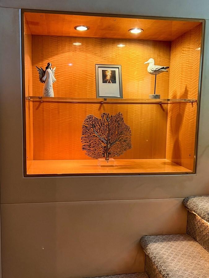 a cat on a shelf aboard DESTINI IV Yacht for Sale