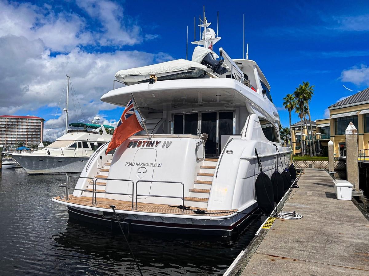a boat docked at a pier aboard DESTINI IV Yacht for Sale