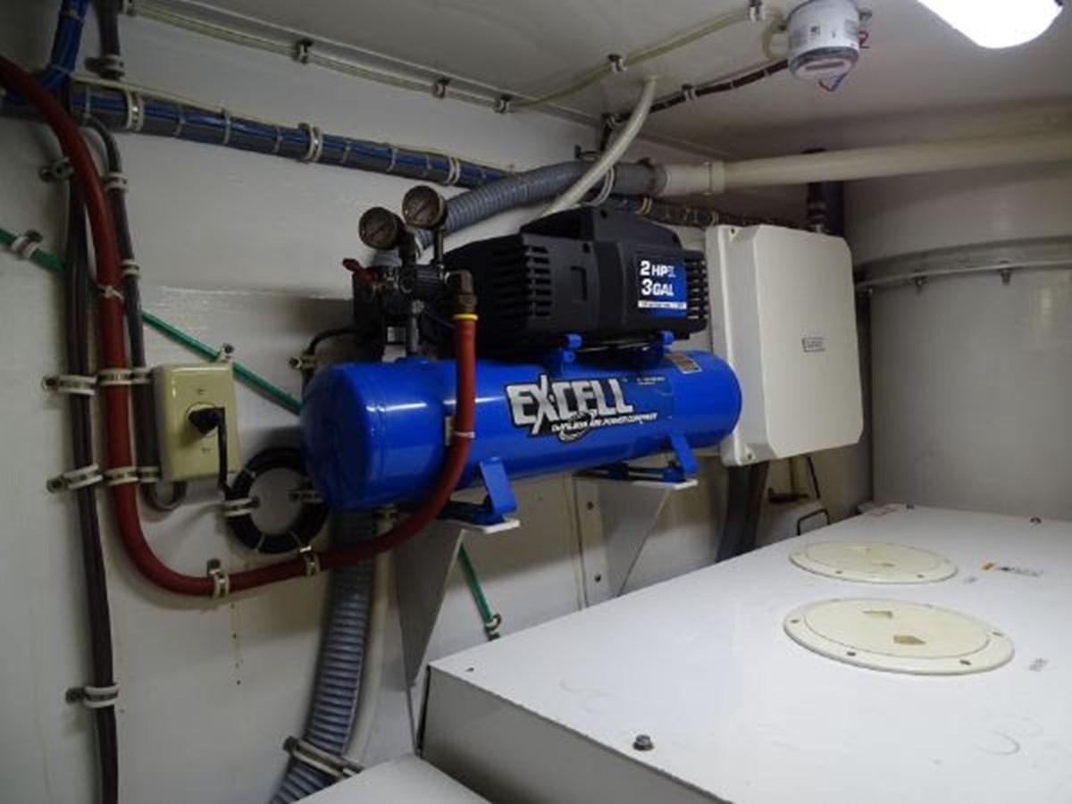 a machine with a blue and red pipe aboard DESTINI IV Yacht for Sale