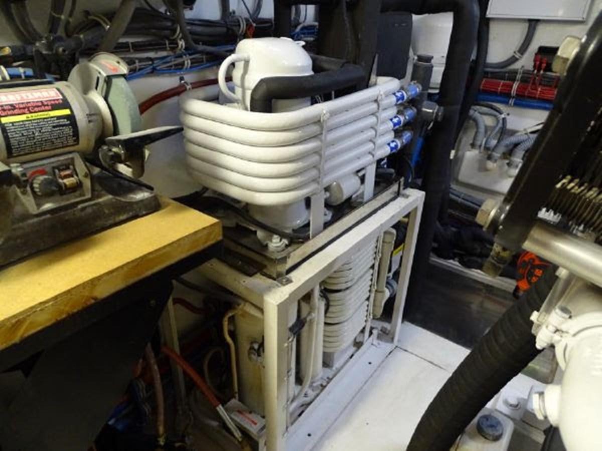 a machine with a large piece of equipment in it aboard DESTINI IV Yacht for Sale