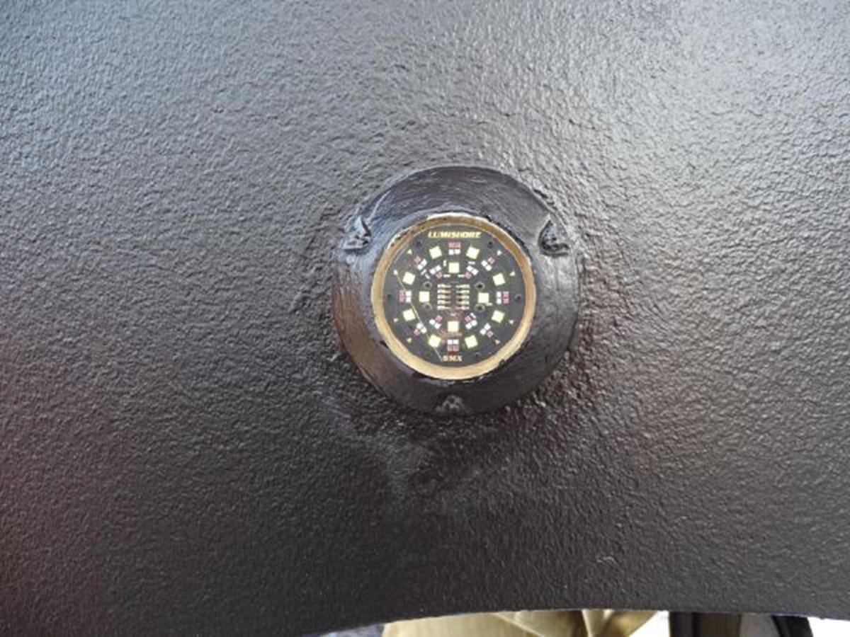a watch on a surface aboard DESTINI IV Yacht for Sale