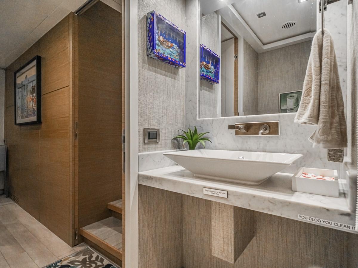 a bathroom with a sink and a mirror aboard SEASEID Yacht for Sale