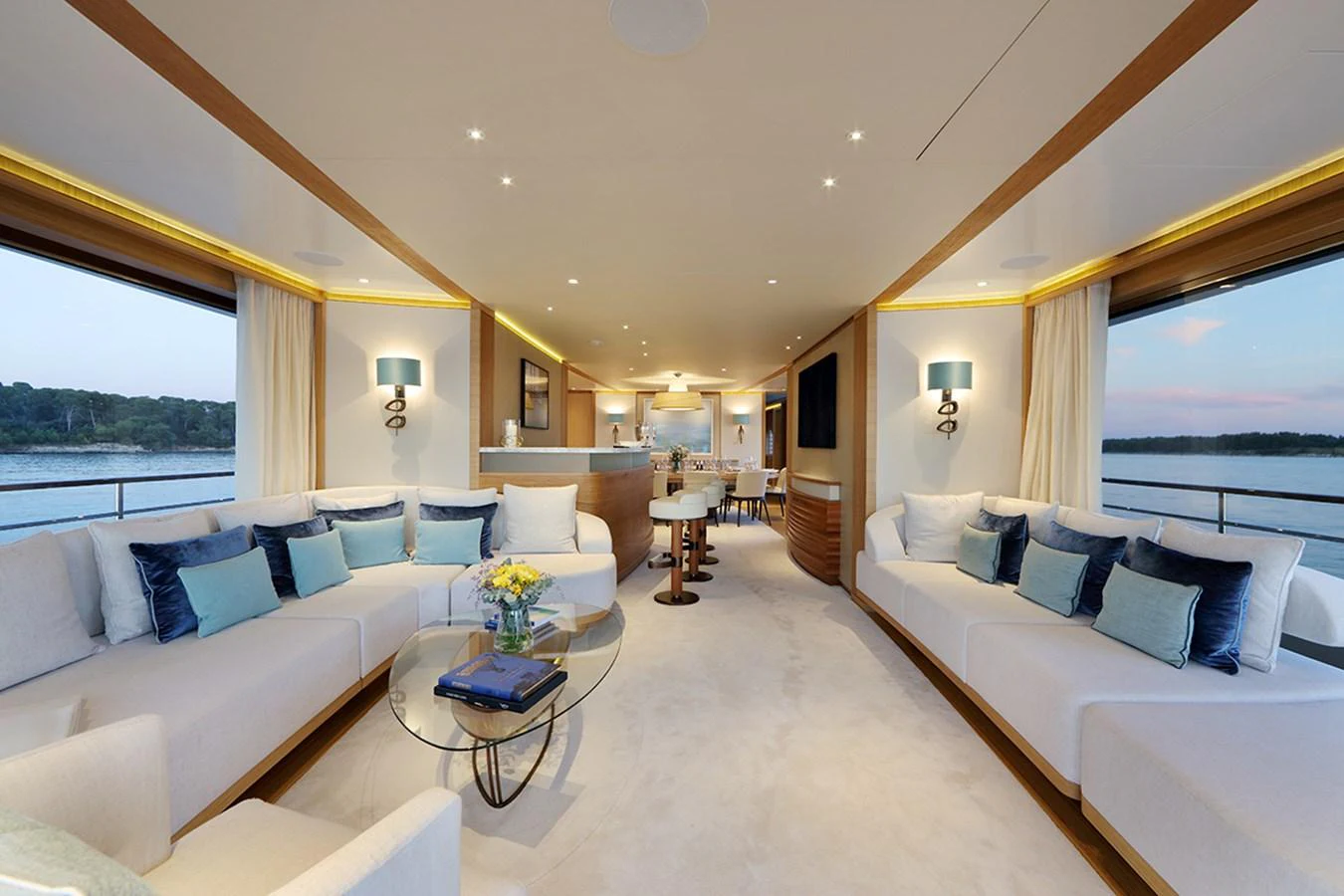 a living room with a large window aboard SOLIS Yacht for Charter