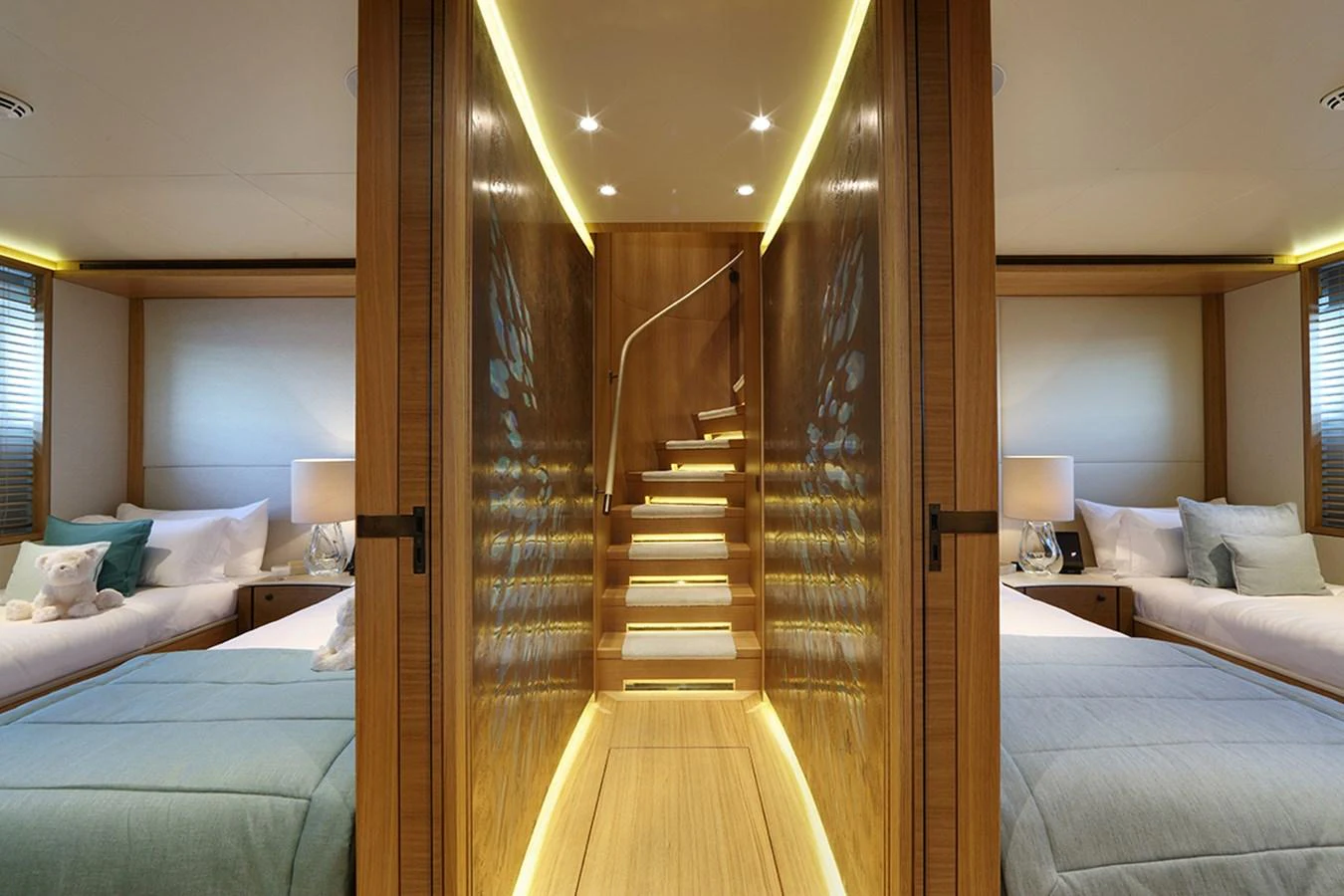 a room with a bed and a door aboard SOLIS Yacht for Charter