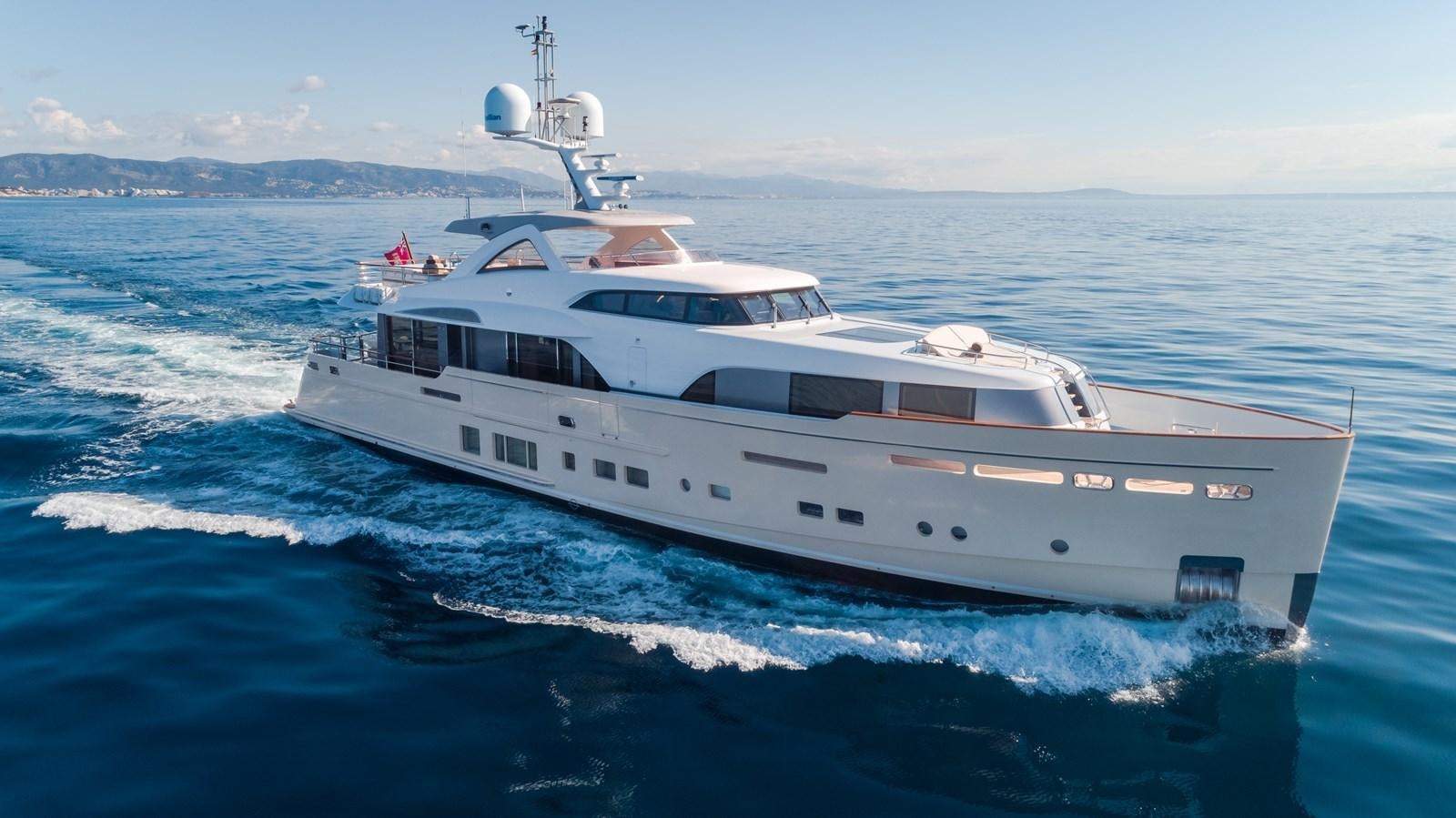 a white yacht on the water aboard SOLIS Yacht for Sale
