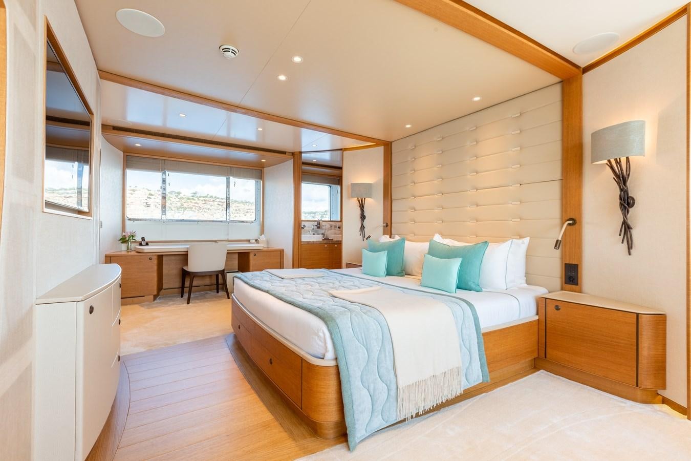 a large bedroom with a bed aboard SOLIS Yacht for Sale