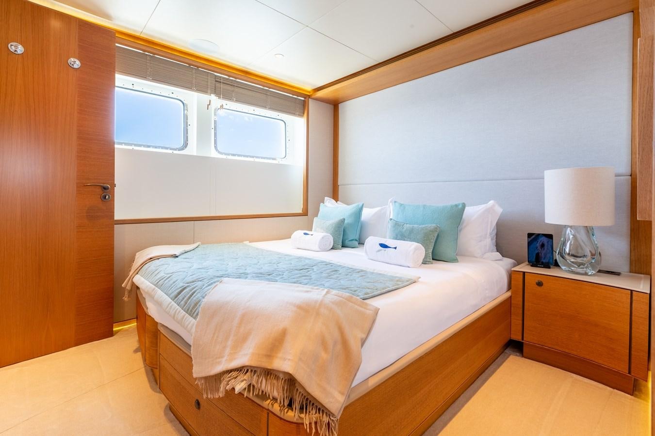 a bed with a pillow on it aboard SOLIS Yacht for Sale