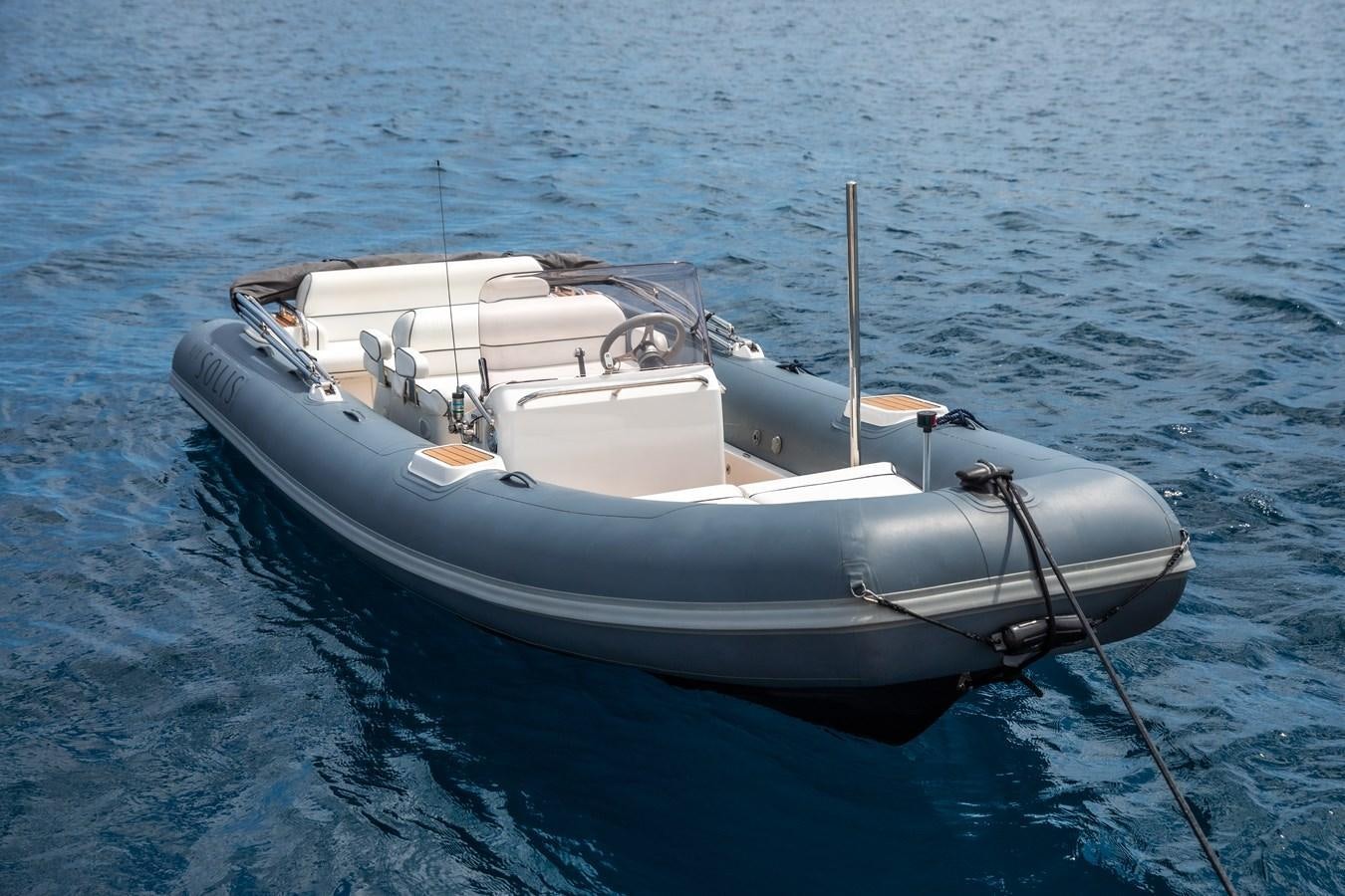 a boat in the water aboard SOLIS Yacht for Sale