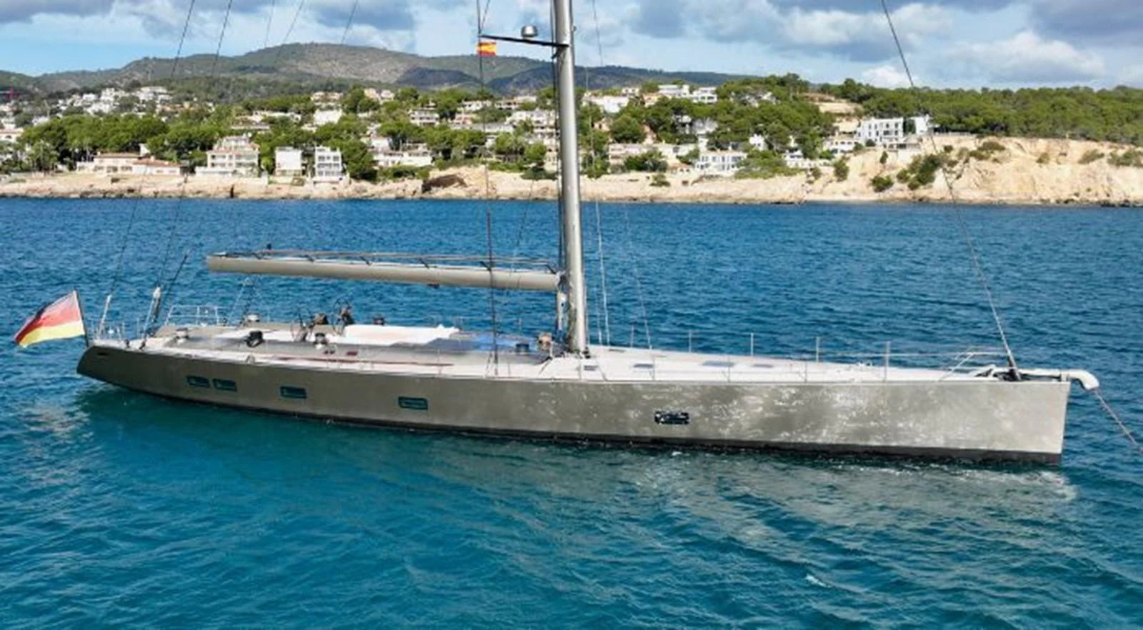 a white boat in the water aboard Y3K Yacht for Sale