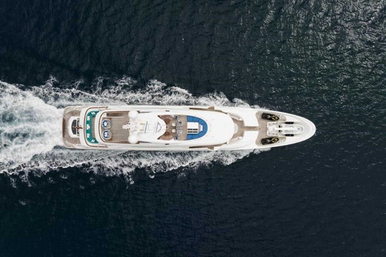 a bottle of beer on a rock aboard BELLE ANNA Yacht for Sale
