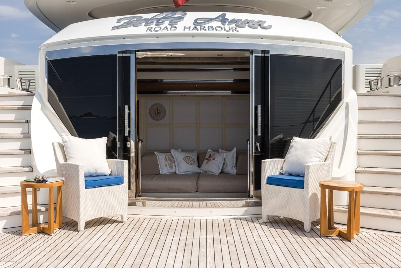 a white tent with a couch and a table in it aboard BELLE ANNA Yacht for Sale