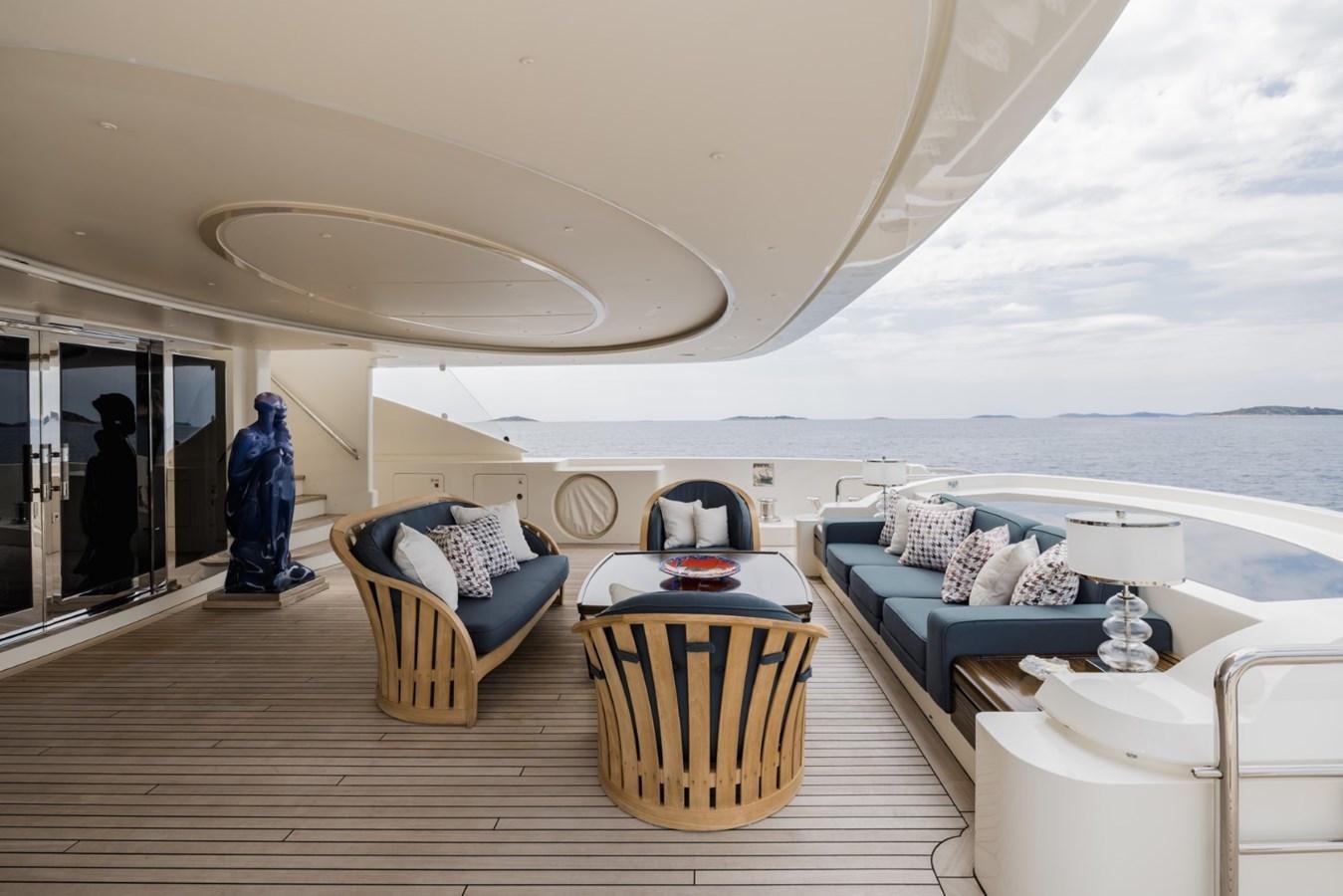 a room with a bed and a couch aboard BELLE ANNA Yacht for Sale
