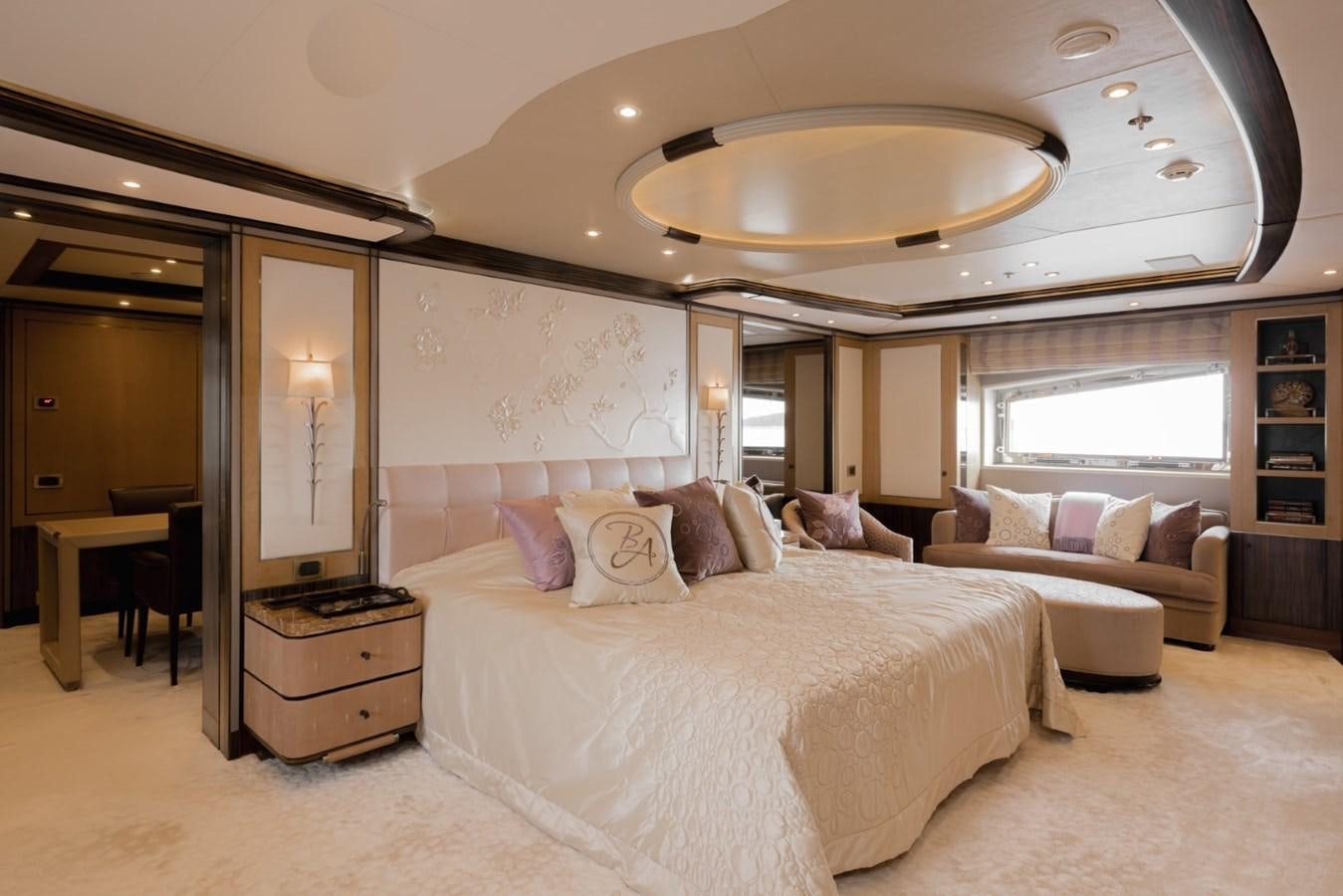 a large bedroom with a large bed aboard BELLE ANNA Yacht for Sale